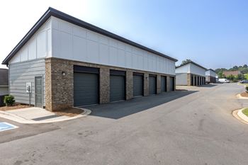 A row of garages with garages on each side of the building
